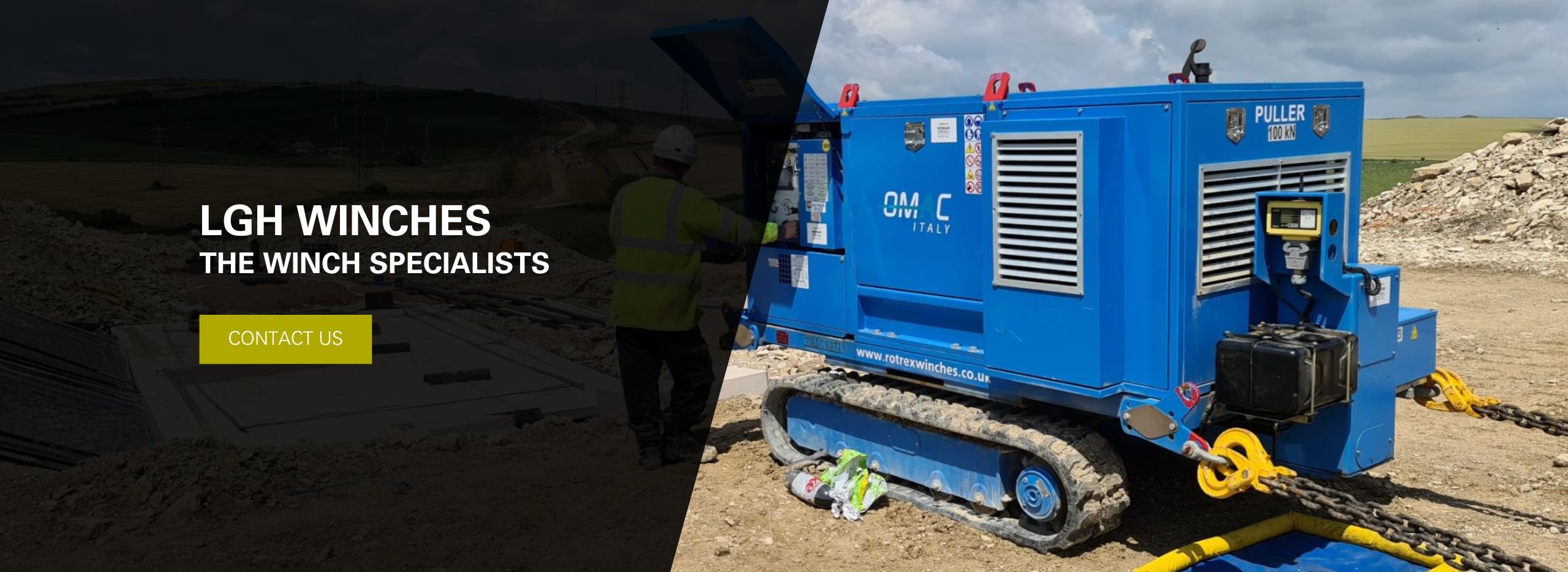 An engineer standing alongside a winch. Click to contact Rotrex