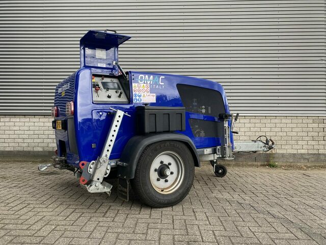 Blue Trailer Winch in carpark outside of the workshop